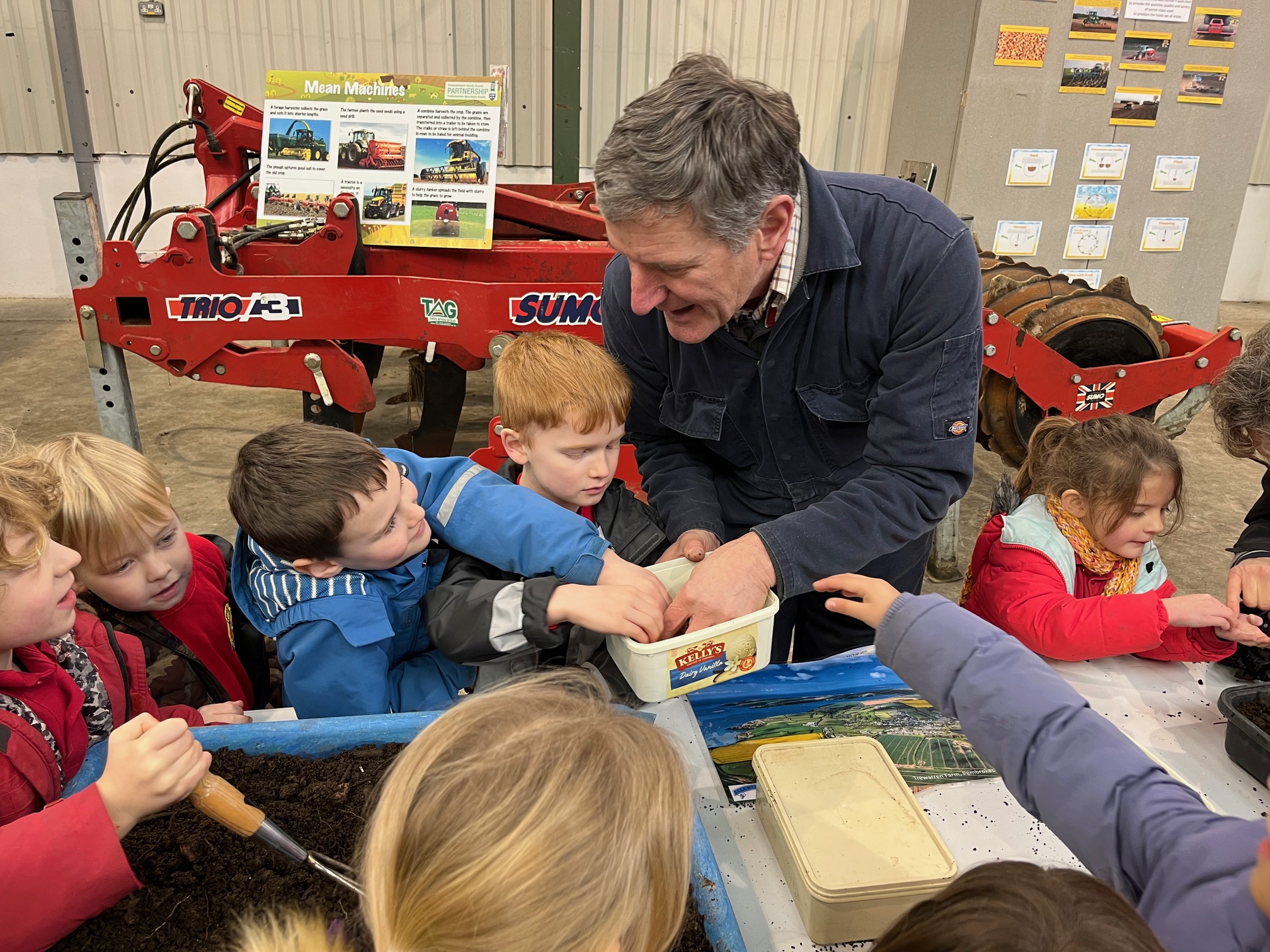 ysgol-bro-ingli-year-2-pupils-getting-hands-on-with-arable-farmer-walter-simon.jpg