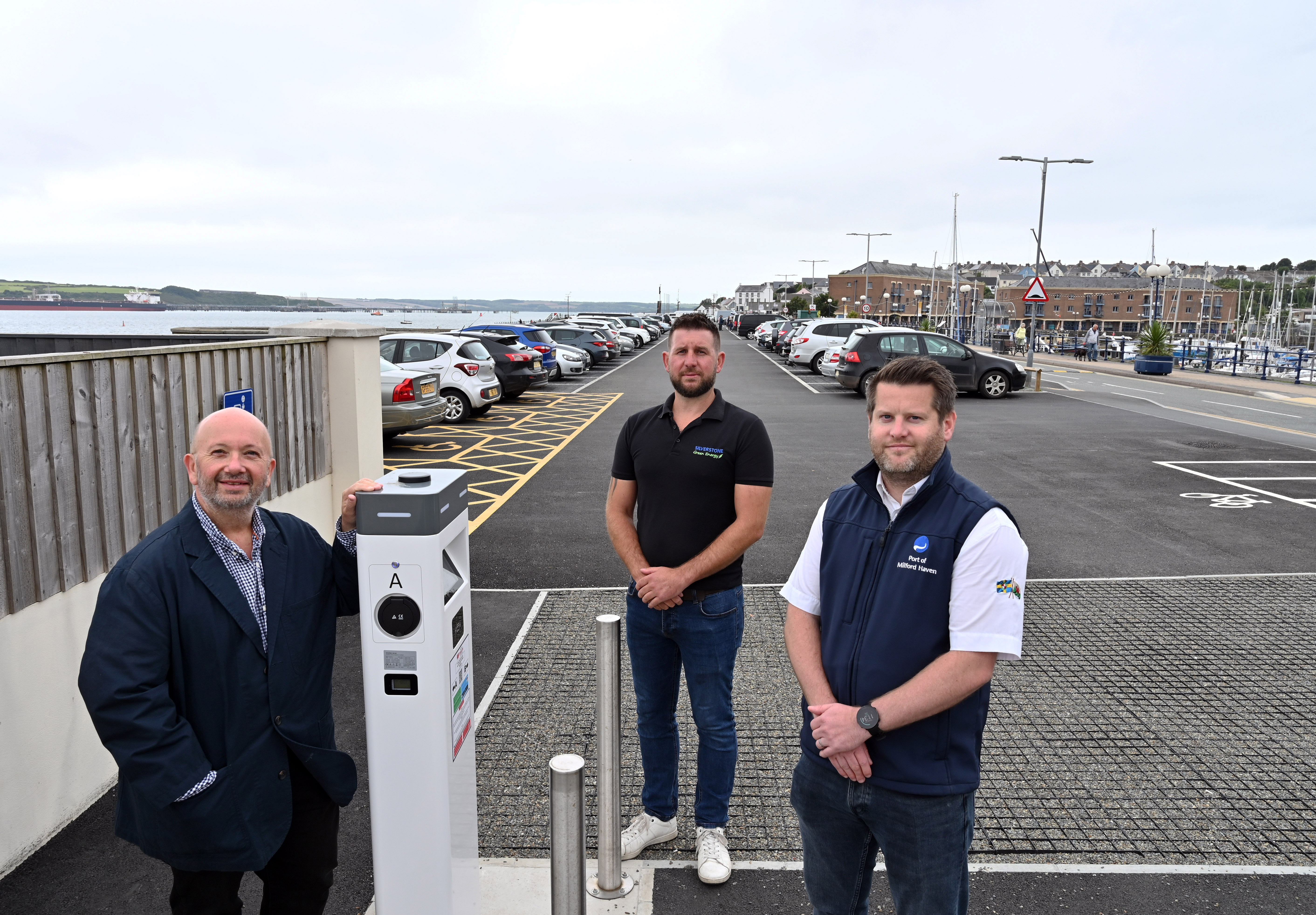 15-11-23-l-r-councillor-rhys-sinnett-andrew-mackay-and-gareth-phillips-at-the-newly-resurfaced-mackerel-quay-car-park.jpg